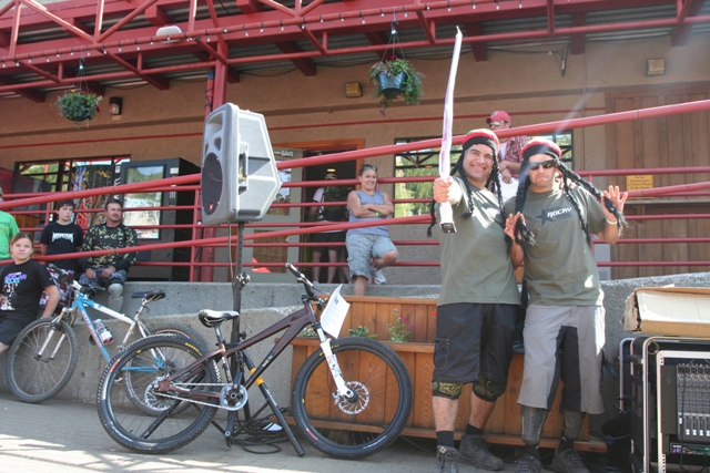 Brett Tippie and Wade Simmons pose with some of the goods that were handed up over the course of the weekend.