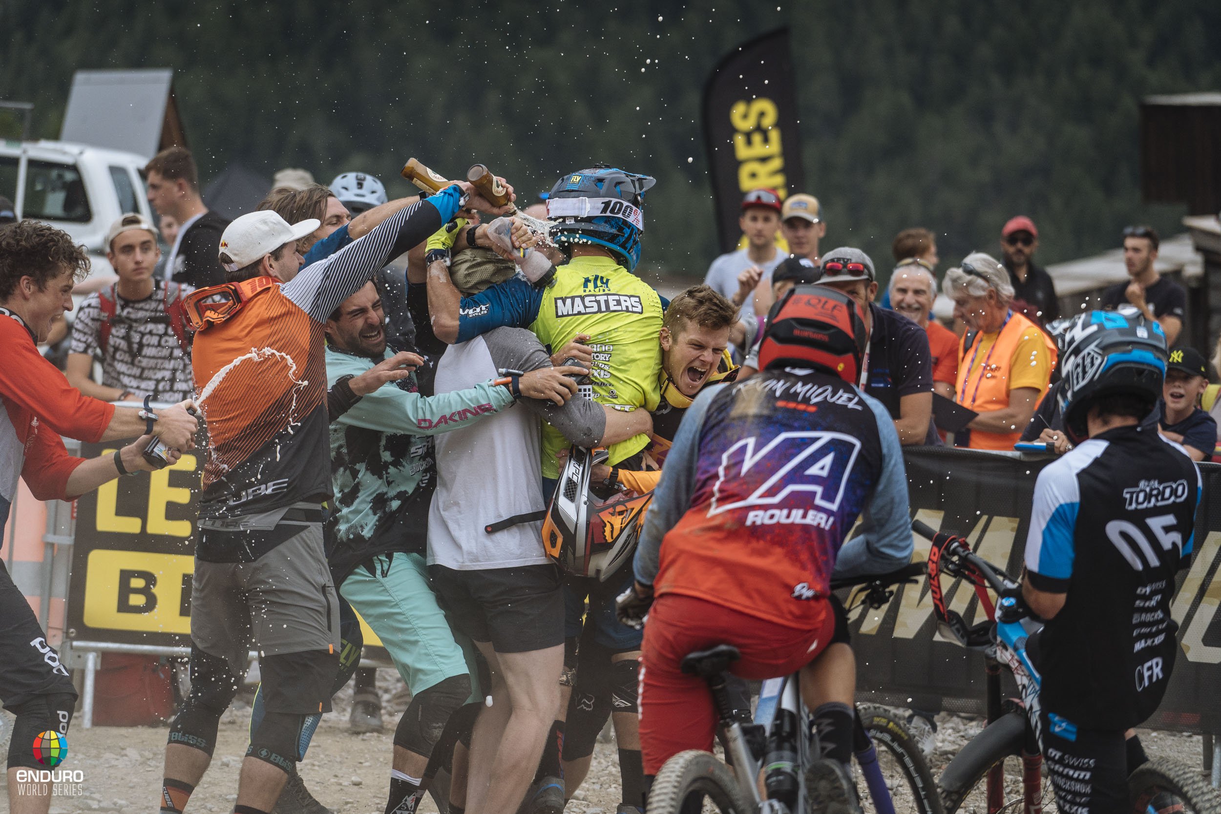 Eddie Masters mobbed by his peers at the finish