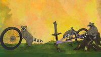 Raccoons taking apart a bike