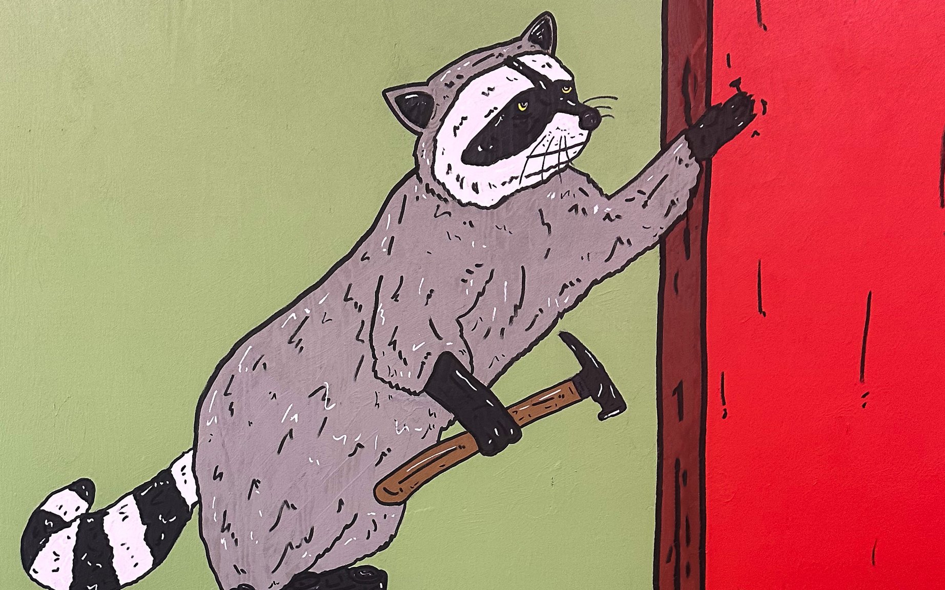 A Raccoon with a hammer
