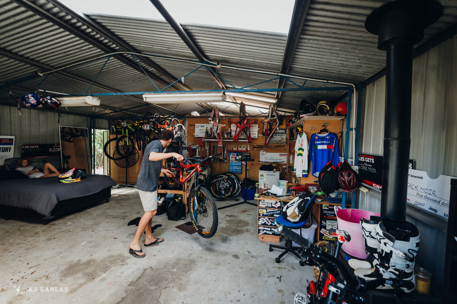 Jack Moir working on his bike at home