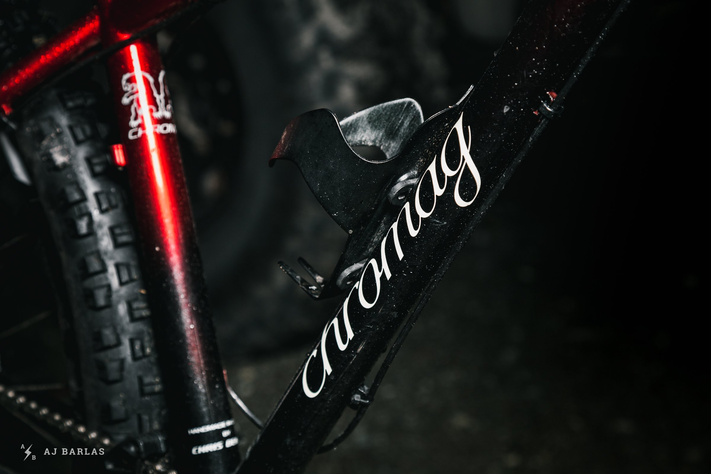 Apple red to black sparkle fade and cursive Chromag logo on Owen Foster's Custom Chromag Surface Sheena
